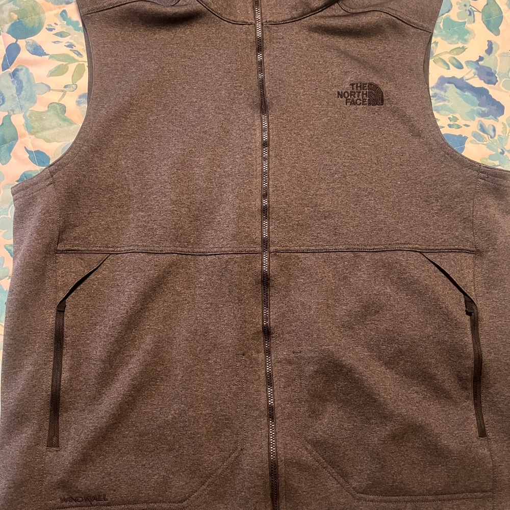 The North face men’s vest size large.